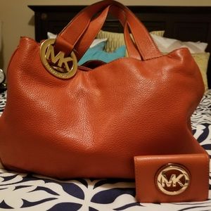 Michael Kors orange handbags and wallet!